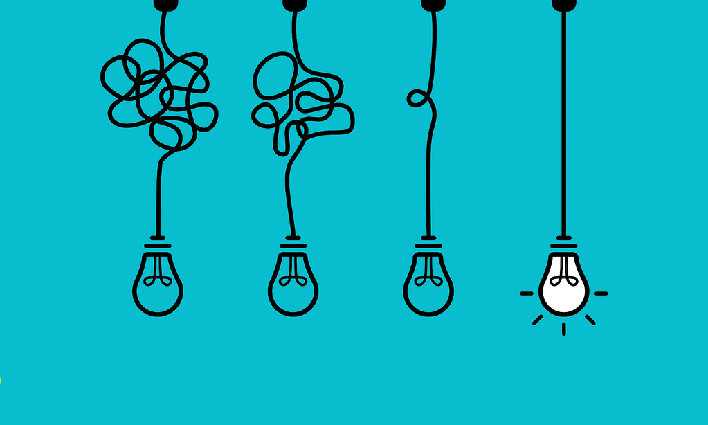 Design Thinking: la metodologia. Immagine fumetto di lampadine dai fili arrotolati